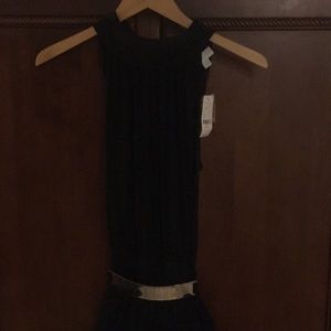 New York and company black jumpsuit. Tie neck